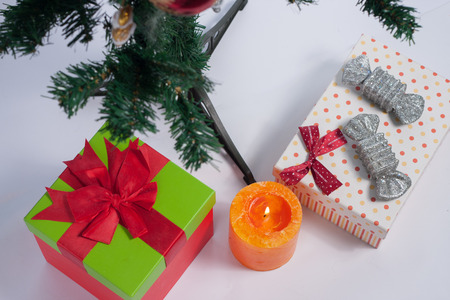 Christmas tree decorated with ornaments and giftsの写真素材