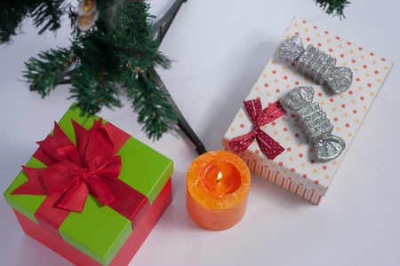 Christmas tree decorated with ornaments and giftsの写真素材