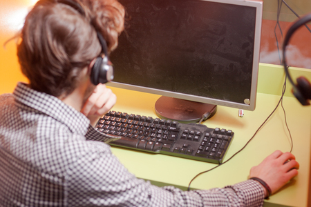 Handsome young call center agent at workの写真素材