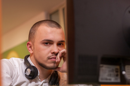 Handsome young call center agent at workの写真素材