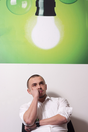 Portrait of call center agent at work in box officeの写真素材