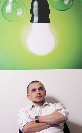 Portrait of call center agent at work in box officeの写真素材