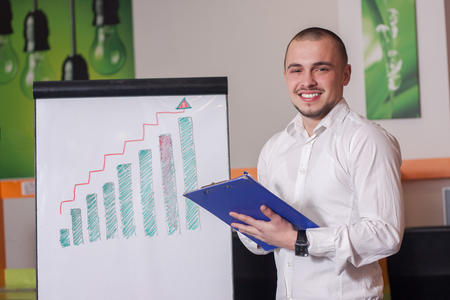 Portrait of call center agent at work in box officeの写真素材