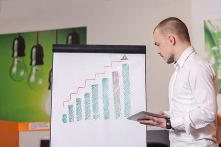 Portrait of call center agent at work in box officeの写真素材