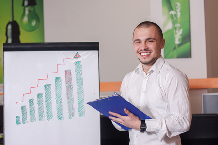 Portrait of call center agent at work in box officeの写真素材