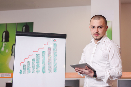 Portrait of call center agent at work in box officeの写真素材