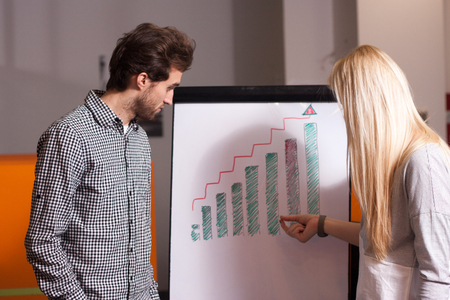 Portrait of call center agent at work in box officeの写真素材