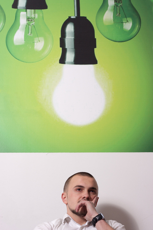 Portrait of call center agent at work in box officeの写真素材