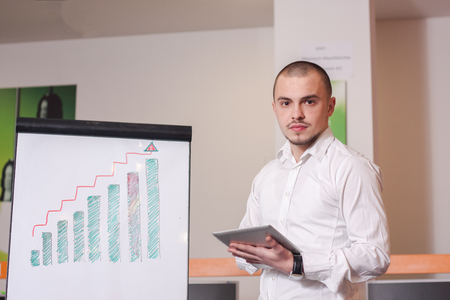 Portrait of call center agent at work in box officeの写真素材