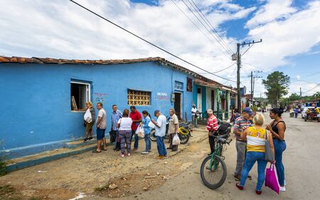 Vinales, Cuba - March 26 2019: People in the line after freshy baked bread, UNESCO, Vinales, Pinar del Rio Province, Cuba, West Indies, Caribbean, Central Americaのeditorial素材