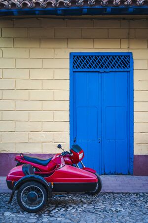 Motorbike with a sidecar in Trinidad, Sancti Spiritus, Cuba, West Indies, Central Americaの写真素材