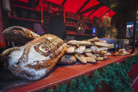 London, England - December 21 2017: Food and fresh bread at London Christmas Market, London, England, United Kingdom, Europeのeditorial素材