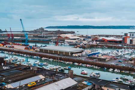 Jersey, Channel Islands - December 31 2018: St. Helier harbour and Elizabeth Castle, Jersey, Channel Islands, United Kingdom Europeのeditorial素材