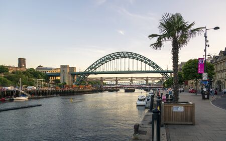 Newcastle, England - June 27 2018: Newcastle upon Tyne skyline, Gateshead with the Tyne Bridge over River Tyne, Tyne and Wear, Tyneside, England, United Kingdom, Europeのeditorial素材