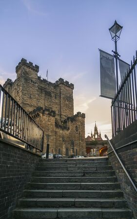 Newcastle, England - June 27 2018: The 12th century Norman Castle Keep, and the Lantern of the Cathedral Church of St. Nicholas, Newcastle upon Tyne, Tyne and Wear, England, United Kingdom, Europeのeditorial素材