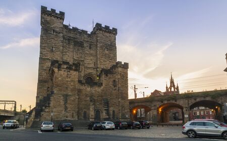 Newcastle, England - June 27 2018: The 12th century Norman Castle Keep, and the Lantern of the Cathedral Church of St. Nicholas, Newcastle upon Tyne, Tyne and Wear, England, United Kingdom, Europeのeditorial素材