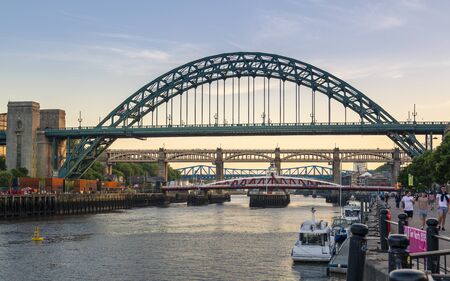 Newcastle, England - June 27 2018: Newcastle upon Tyne skyline, Gateshead with the Tyne Bridge over River Tyne, Tyne and Wear, Tyneside, England, United Kingdom, Europeのeditorial素材