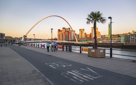 Newcastle, England - June 27 2018: Gateshead Millennium Bridge over River Tyne, Newcastle-upon-Tyne, Tyne and Wear, Tyneside, England, United Kingdom, Europeのeditorial素材