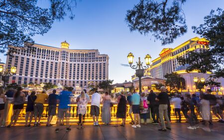Las Vegas, USA - May 24 2018: People enjoying Fountains of Bellagio, The Strip, Las Vegas Boulevard, Las Vegas, Nevada, United States of America, North Americaのeditorial素材