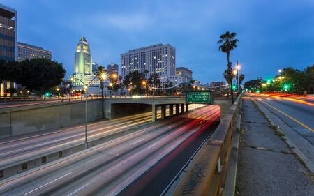 Los Angeles, USA - May 30 2018: Downtown financial district of Los Angeles city and busy freeway at night, California, United States of America, North Americaのeditorial素材