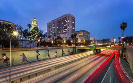 Los Angeles, USA - May 30 2018: Downtown financial district of Los Angeles city and busy freeway at night, California, United States of America, North Americaのeditorial素材