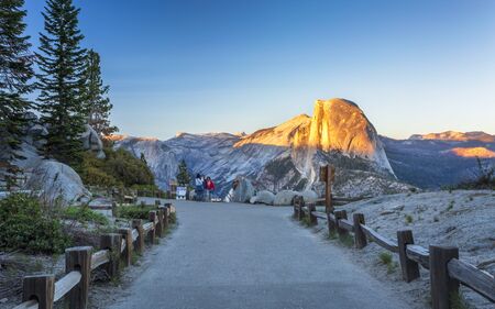 YOSEMITE, USA - JUNE 3, 2018: Half Dome at dusk from Glacier Point above Yosemite Valley, California, USA.のeditorial素材
