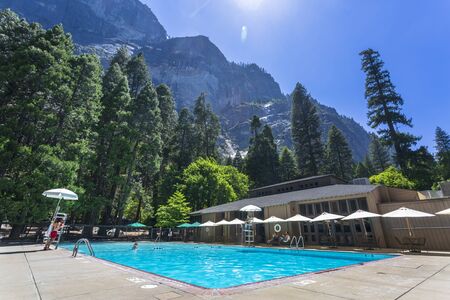 YOSEMITE, USA - JUNE 3, 2018: Swimming pool in Half Dome Village, Yosemite National Park, California.のeditorial素材