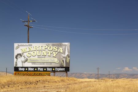 YOSEMITE, USA - JUNE 3, 2018: Mariposa County home of Yosemite National Park sign, California, USA, North Americaのeditorial素材