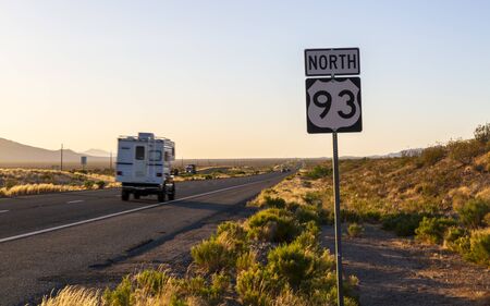 Kingsman, USA - MAY 26, 2018: Sunset over North 93 Highway near Kingman, Arizona, United States of America, North Americaのeditorial素材