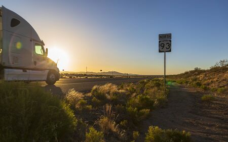 Kingsman, USA - MAY 26, 2018: Sunset over North 93 Highway near Kingman, Arizona, United States of America, North Americaのeditorial素材