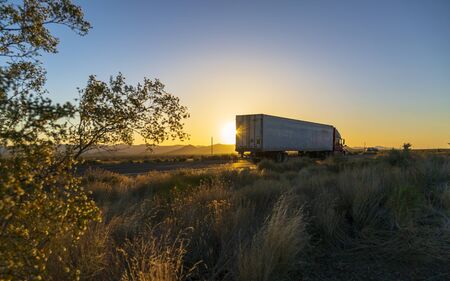 Kingsman, USA - MAY 26, 2018: Sunset over North 93 Highway near Kingman, Arizona, United States of America, North Americaのeditorial素材