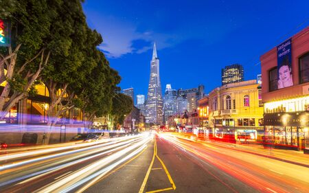 San Francisco, USA - June 8 2018: View of Transamerica Pyramid building on Columbus Avenue and car trail lights, San Francisco, California, USA, North Americaのeditorial素材