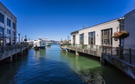 San Francisco, USA - June 8 2018: Pier 1 and Oukland Bay Bridge, San Francisco, California, United States of America, North Americaのeditorial素材