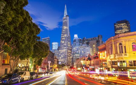 San Francisco, USA - June 8 2018: View of Transamerica Pyramid building on Columbus Avenue and car trail lights, San Francisco, California, USA, North Americaのeditorial素材