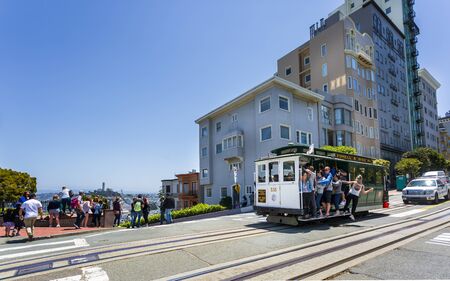 San Francisco, USA - June 8 2018: View of Cable car and Lombard Street, San Francisco, California, United States of America, North Americaのeditorial素材