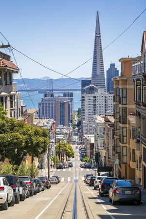 San Francisco, USA - June 11 2018: Street view of Transamerica Pyramid and Oakland Bay bridge San Francisco, California, USA, North Americaのeditorial素材