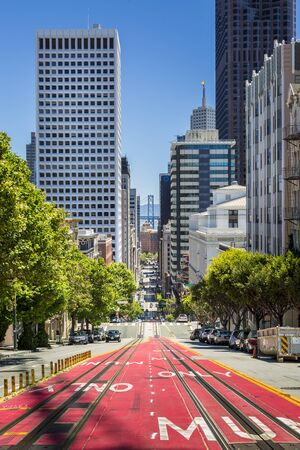 San Francisco, USA - June 11 2018: View of California Street and Oukland Bay Bridge, San Francisco, California, USA, North Americaのeditorial素材