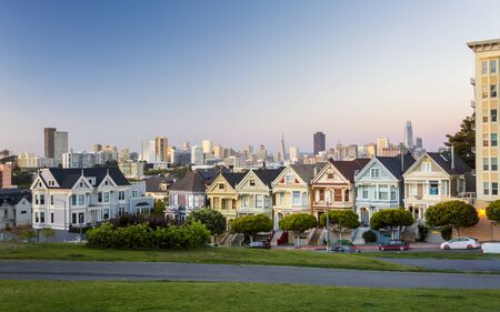 View of Painted Ladies at dusk, Victorian wooden houses, Alamo Square, San Francisco, California, United States of America, North Americaの写真素材