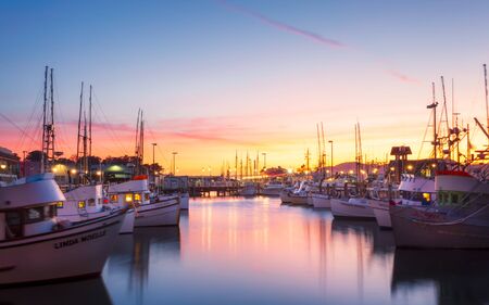 San Francisco, USA - June 10 2018: Sunset over Yachts at Fishermans Wharf, San Francisco, California, United States of America, North Americaのeditorial素材