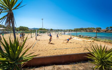 Crete, Greece - April 22 2018: People playing volleyball at Beach Canteen Iguana, Crete, Greek Islands, Greece, Europeのeditorial素材