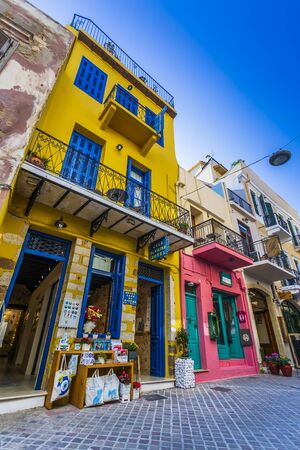 Crete, Greece - April 23 2018: Colourful buildings and souvenir shop in Crete, Greek Islands, Greece, Europeのeditorial素材