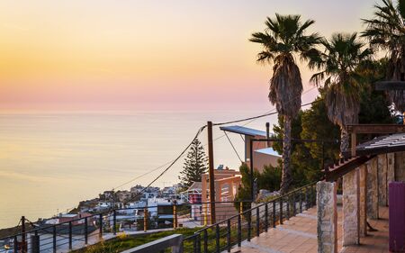 Crete, Greece - April 24 2018: Gloomy sunset over Mediterranean Sea, Akrotiri, Crete, Greek Islands Greece Europeのeditorial素材