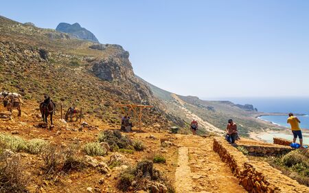 Crete, Greece - April 25 2018: Donkey taxi near Balos Beach, Gramvoussa Peninsula, Balos Bay, Gramvousa Peninsula, Crete, Greek Islands, Greece Europeのeditorial素材