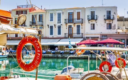 Crete, Greece - April 26 2018: Old Venetian harbour, taverns on seaside, Rethymno (Rethymnon), Crete, Greek Islands Greece Europeのeditorial素材