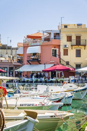 Crete, Greece - April 26 2018: Old Venetian harbour, taverns on seaside, Rethymno (Rethymnon), Crete, Greek Islands Greece Europeのeditorial素材
