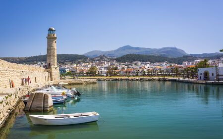 Crete, Greece - April 26 2018: Lighthouse at old Venetian harbour, Rethymno (Rethymnon), Crete, Greek Islands, Greece Europeのeditorial素材