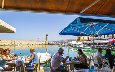 Crete, Greece - April 26 2018: Lighthouse at old Venetian harbour, Rethymno (Rethymnon), Crete, Greek Islands, Greece Europeのeditorial素材