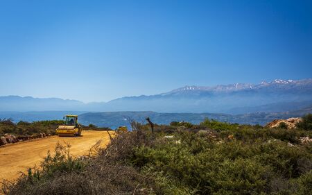 Crete, Greece - April 24 2018: Road roller building a road, Crete, Greek Islands, Greece Europeのeditorial素材
