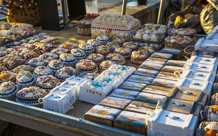 Crete, Greece - April 27 2018: Colourful souvenirs and sea shells for sale in Crete, Greek Islands, Greece, Europeのeditorial素材