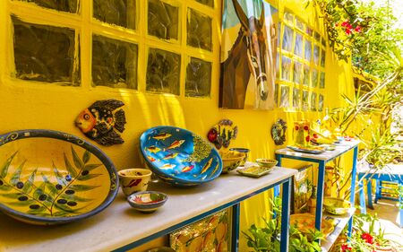 Colourful traditional Cretan pottery and souvenirs for sale in Crete, Greek Islands, Greece, Europeのeditorial素材